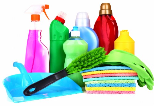 Living room deep cleaning with dusting and furniture care