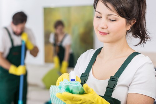 Cleaning staff maintaining desks and shared office areas in Docklands