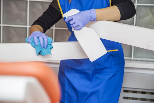 Commercial cleaning staff sanitizing a busy business lobby